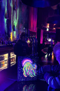 Photo 1 from Neon Brush: A Glow-in-the-Dark Painting Experience